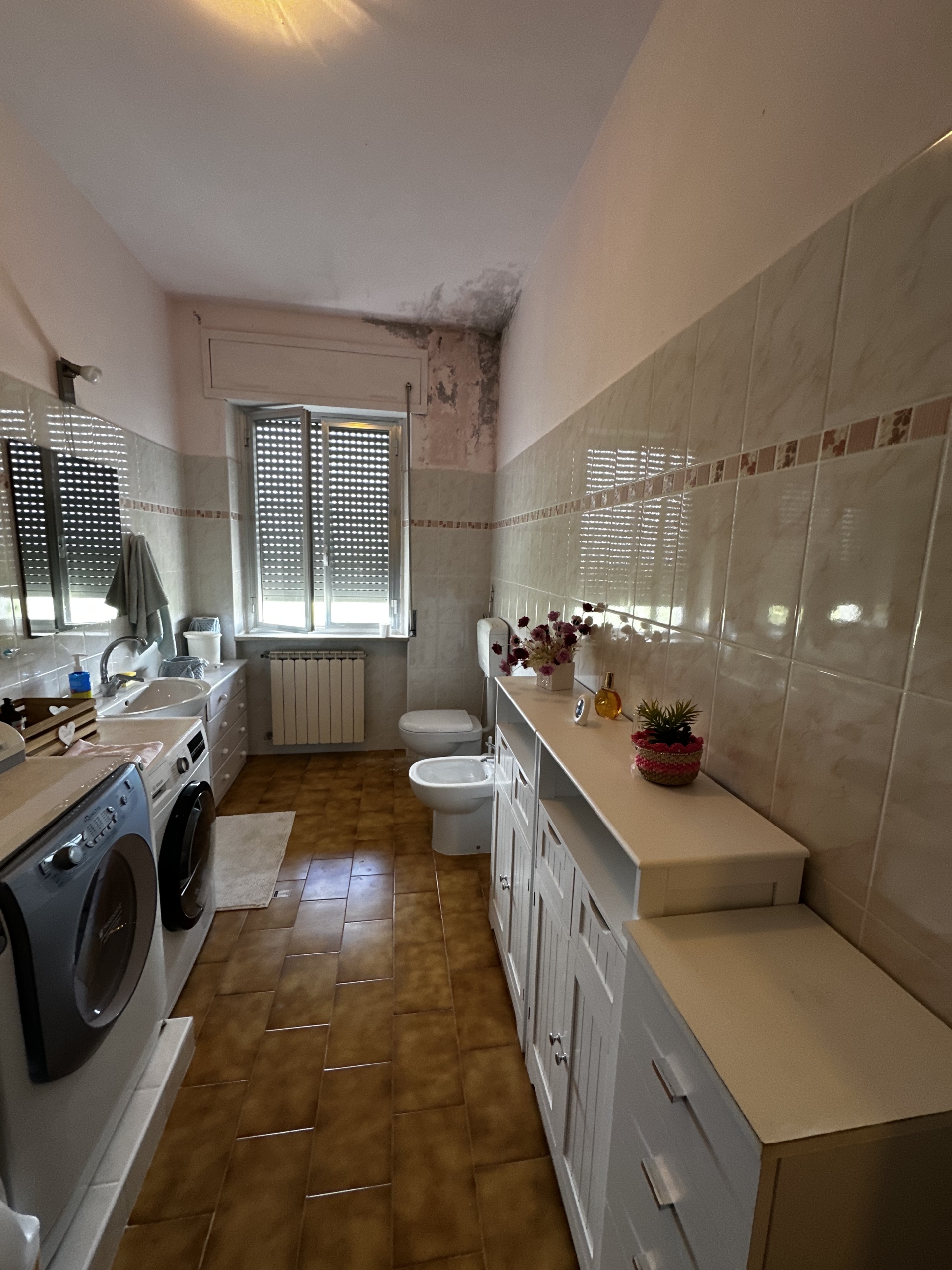 APPARTAMENTO IN BIFAMILIARE CON TERRENO