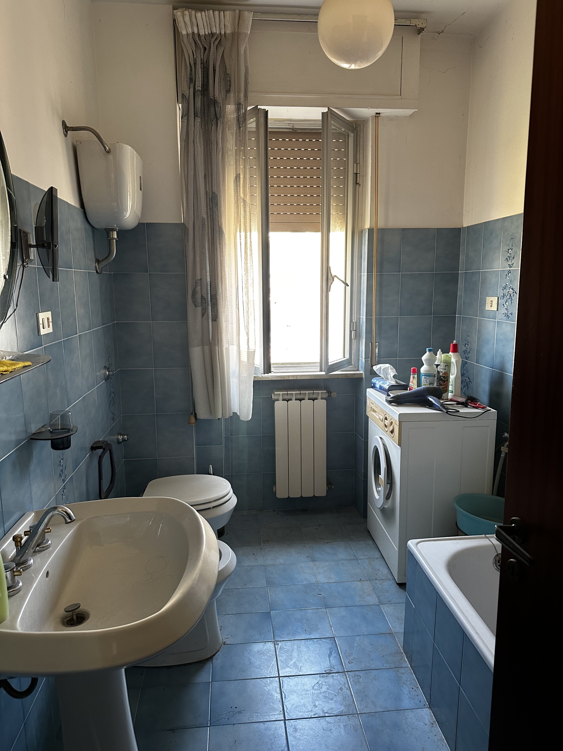 APPARTAMENTO CON GARAGE E GIARDINO CONDOMINIALE