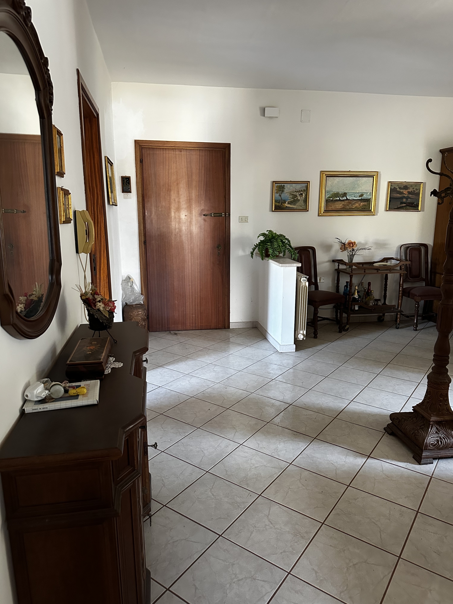 APPARTAMENTO CON GARAGE E GIARDINO CONDOMINIALE