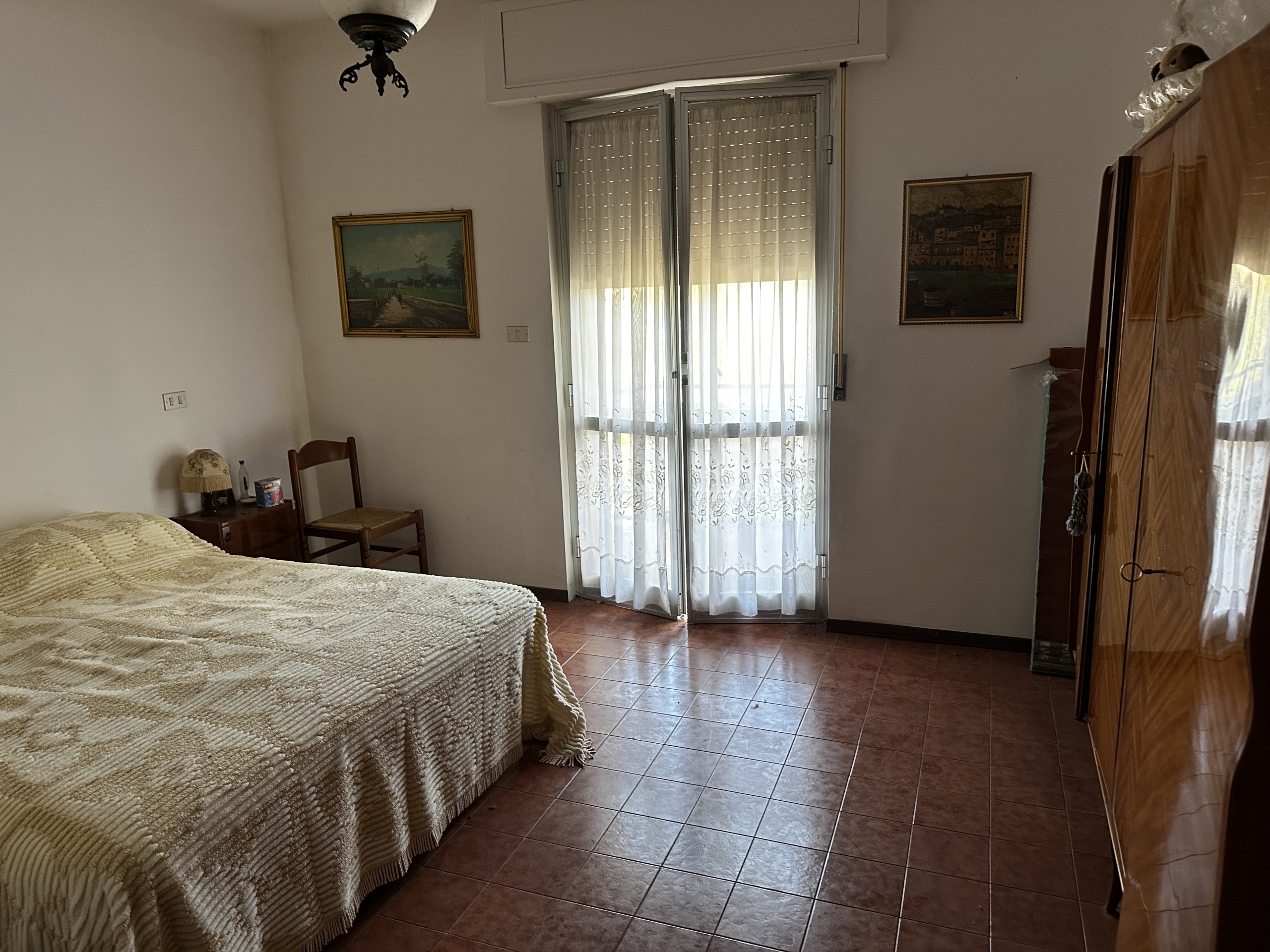 APPARTAMENTO CON GARAGE E GIARDINO CONDOMINIALE