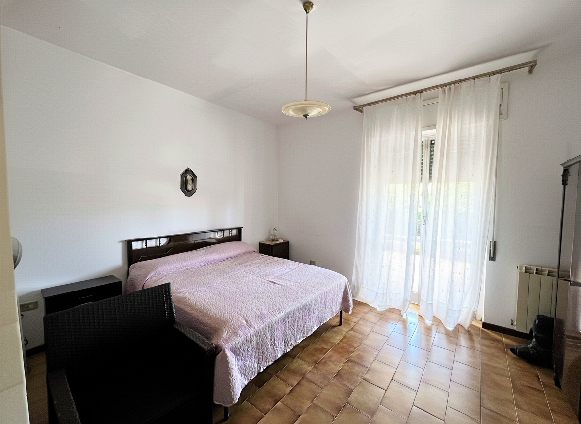 APPARTAMENTO IN BIFAMILIARE CON TERRENO
