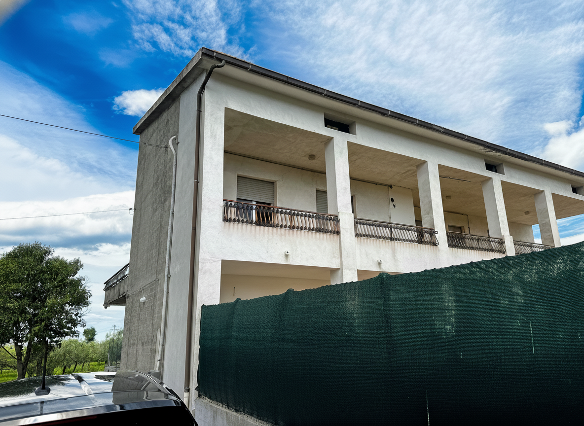 APPARTAMENTO IN BIFAMILIARE CON TERRENO